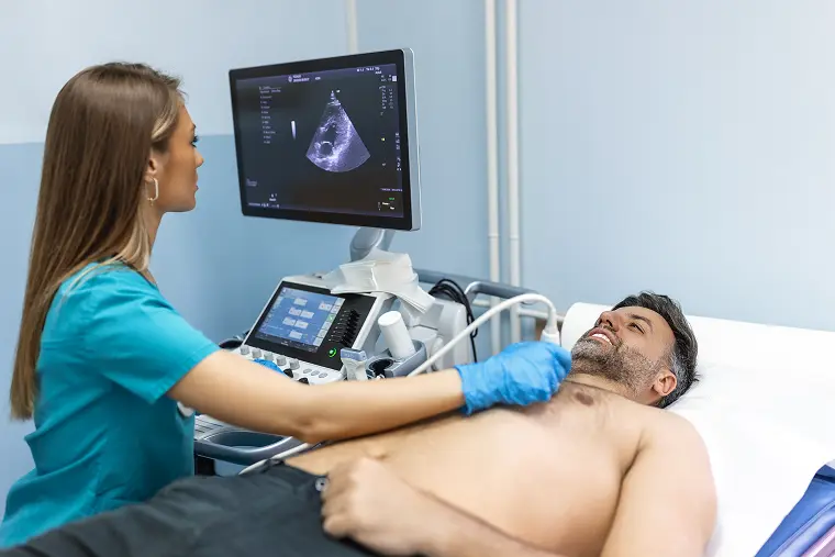 Female technician performing ultrasound